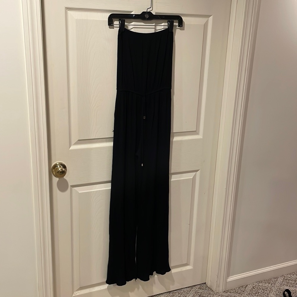 Black strapless jumper, size small, with pockets.
